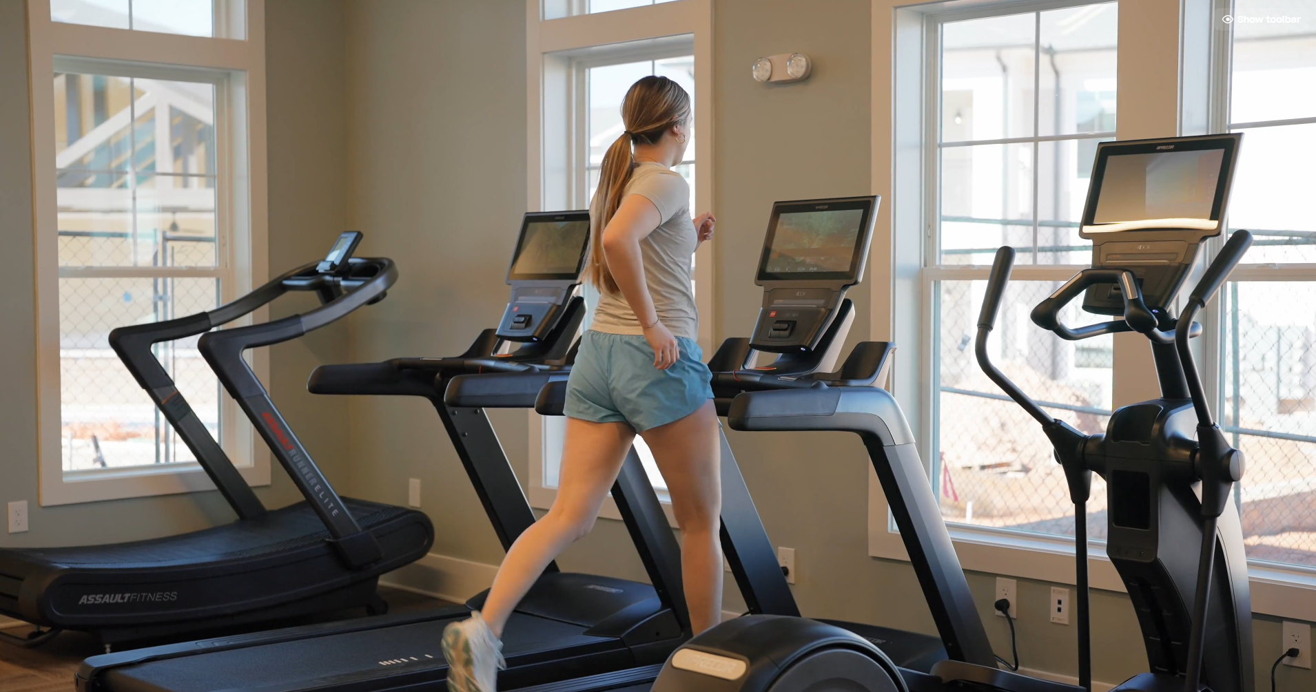 A person using a treadmill at The Lodges at Fort Mill.