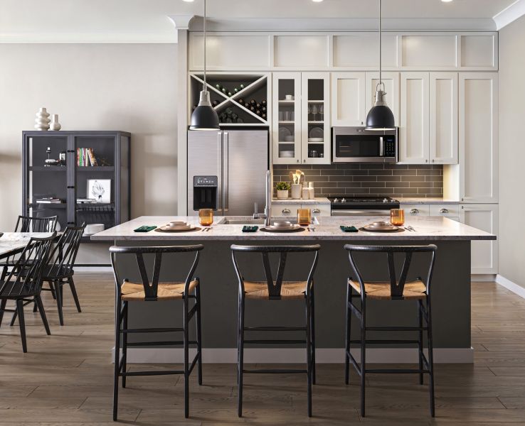 Modern kitchen with a large island, three chairs, pendant lights, stainless steel appliances, and a dining area in the background.